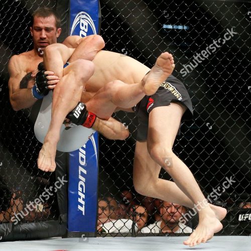 Mandatory Credit: Photo by John Locher/AP/Shutterstock (9541345b)
Chris Weidman, Luke Rockhold. Chris Weidman, right, fights Luke Rockhold in a middleweight championship mixed martial arts bout at UFC 194, in Las Vegas
UFC 194 Mixed Martial Arts, Las Vegas, USA - 12 Dec 2015